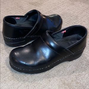 Sanita black leather clogs size 39
